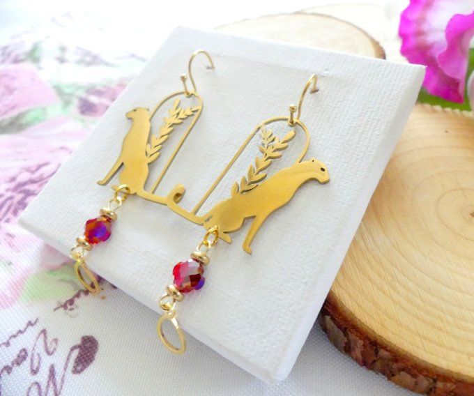 Boucles d'oreilles panthère en acier doré et perles de cristal